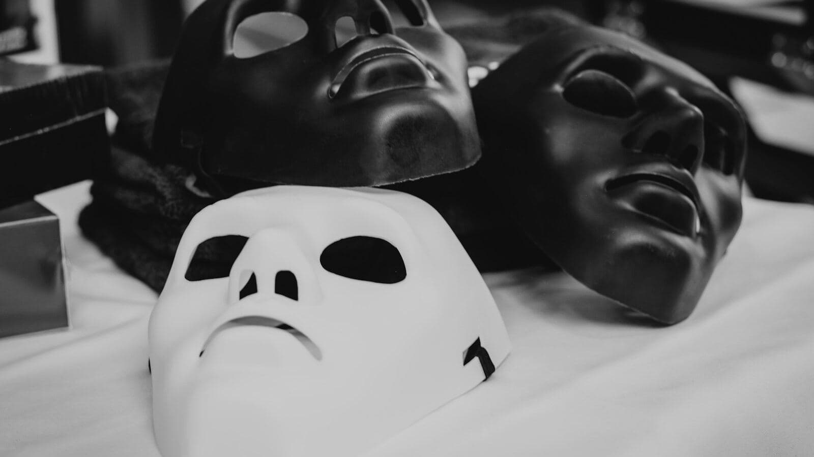 White and black masks on a cloth