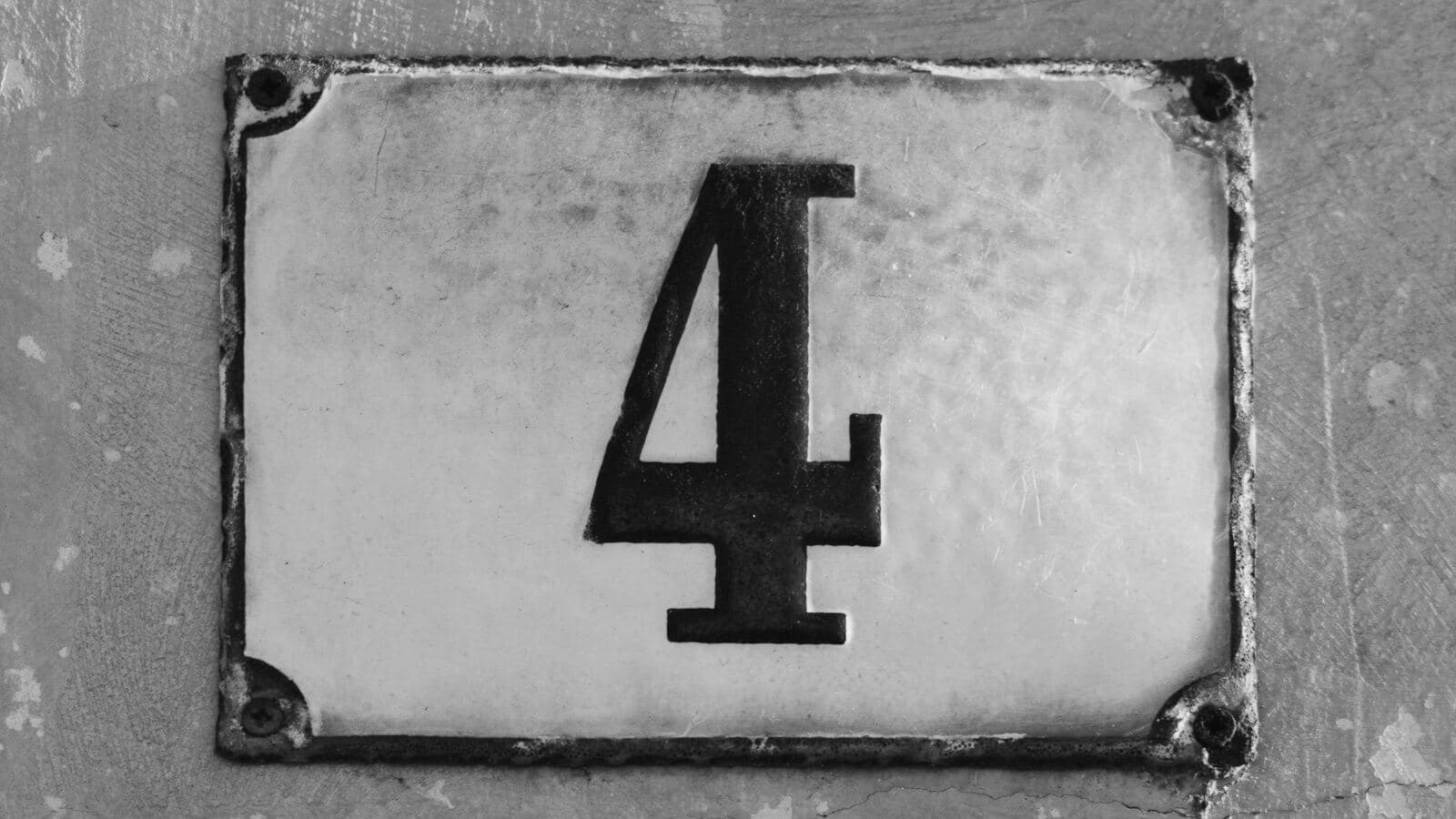 An enamel plate with the number 4